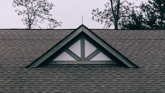 Zoomed in image of a roof with shingles